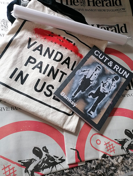 buy Banksy Cut and Run merchandise including a tote bag, Cut n Run book, 2 Cut n Run posters and souvenir Glasgow herald newspaper